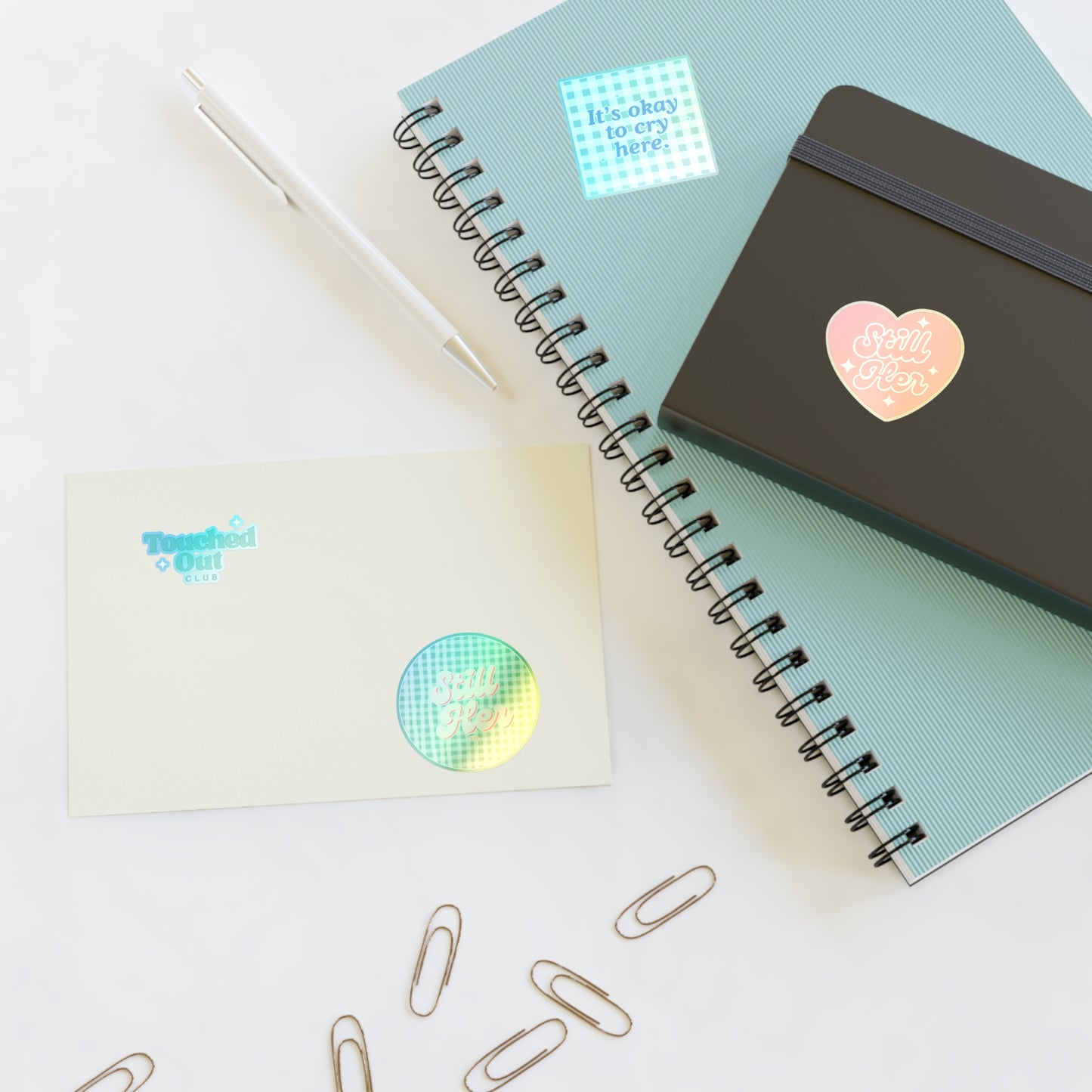 Sticker Sheets with Still Her Co Logos and Touched out Club Design