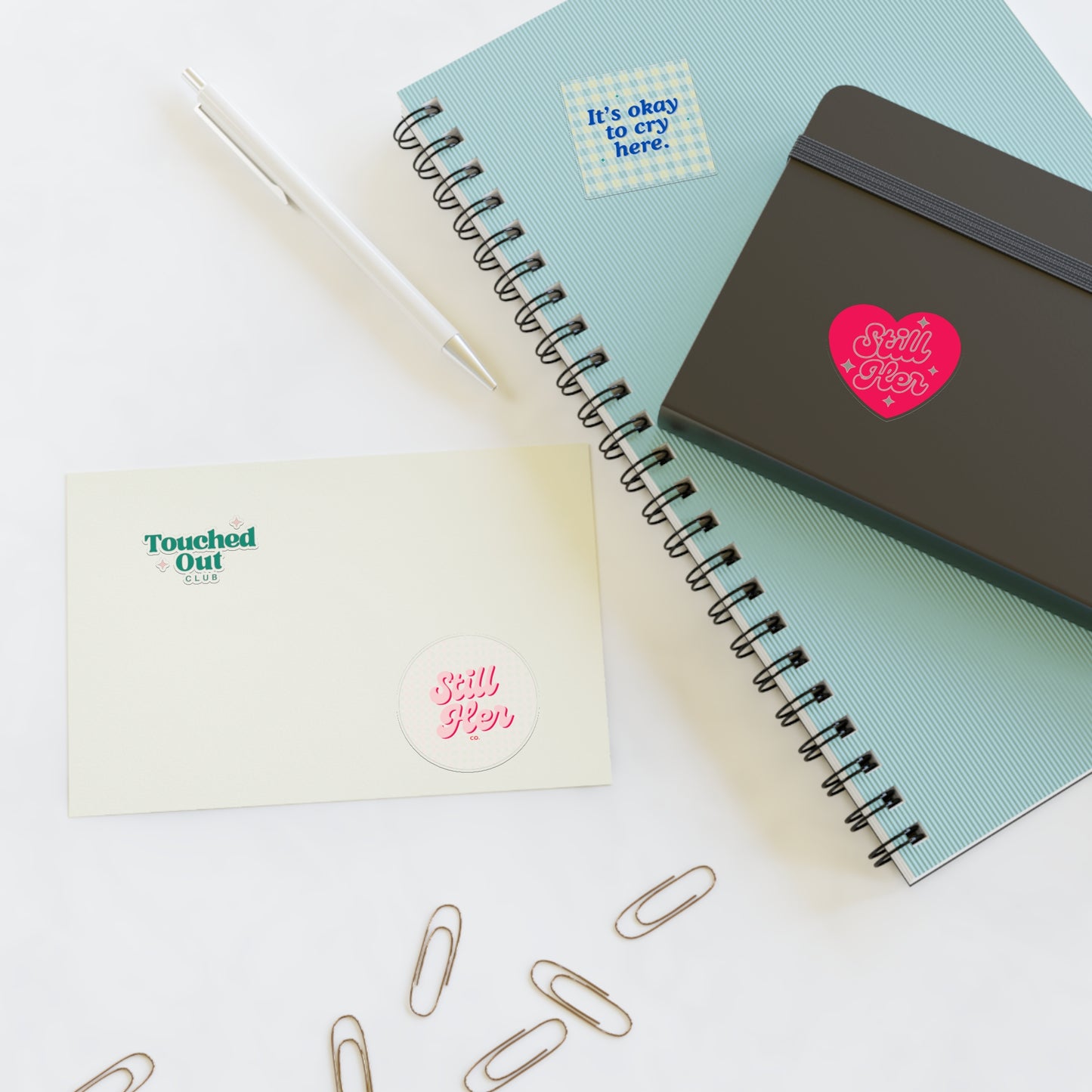 Sticker Sheets with Still Her Co Logos and Touched out Club Design