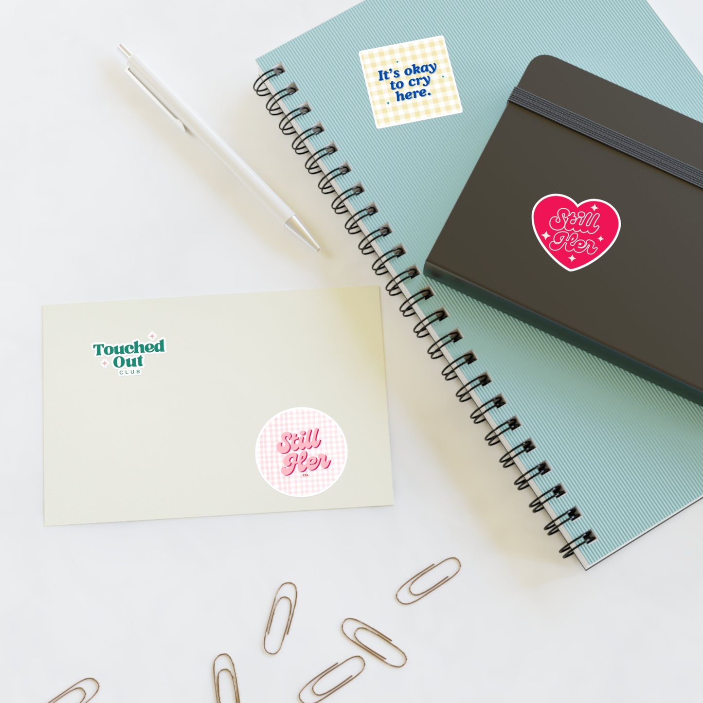 Sticker Sheets with Still Her Co Logos and Touched out Club Design